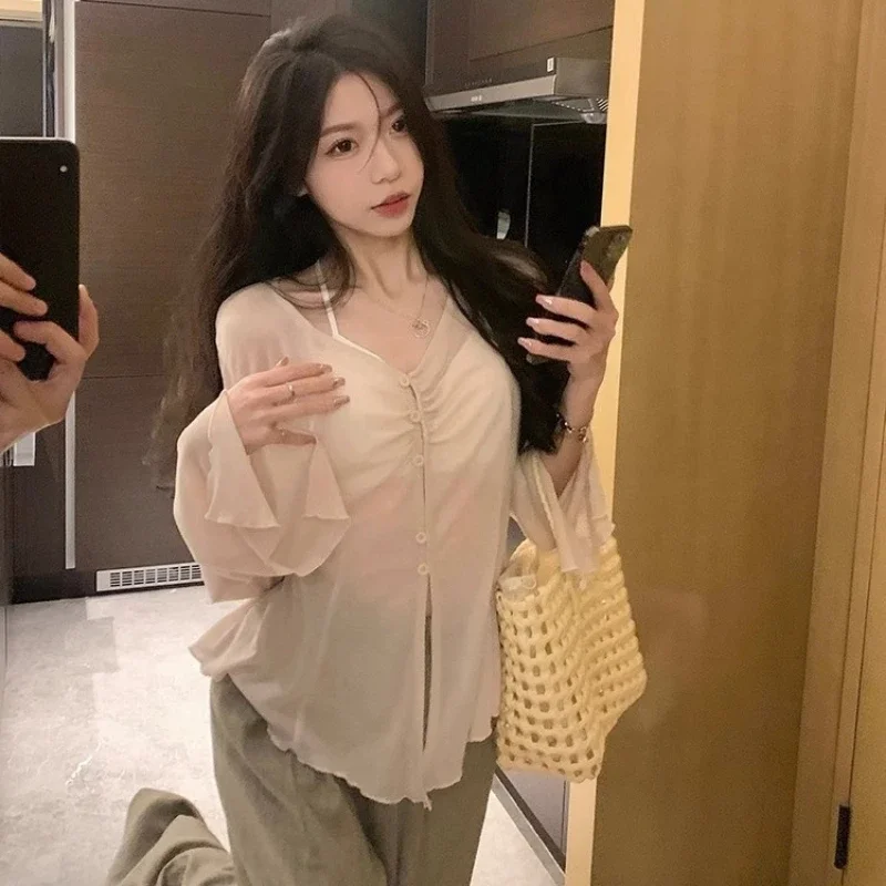 Doorzichtige blouse met wijde  - Shirts recensie en prijs